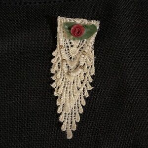 Elegant Cream Lace Brooch with Red Rose Accent